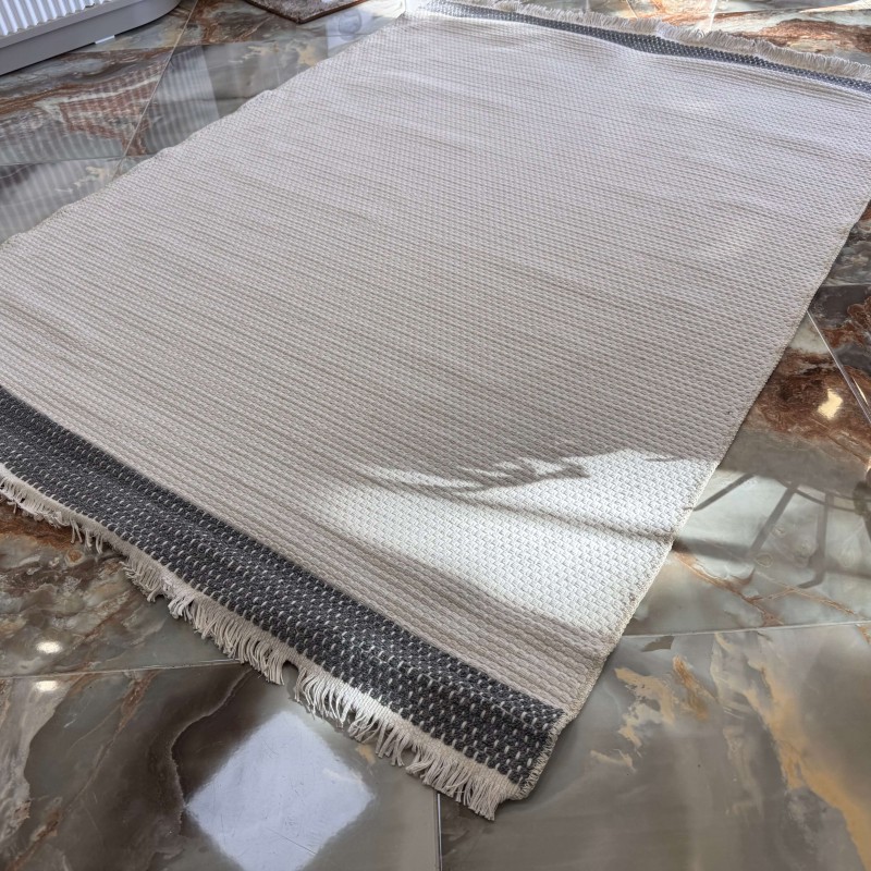 Бежово памучно килимче с бордюр 120x180 см